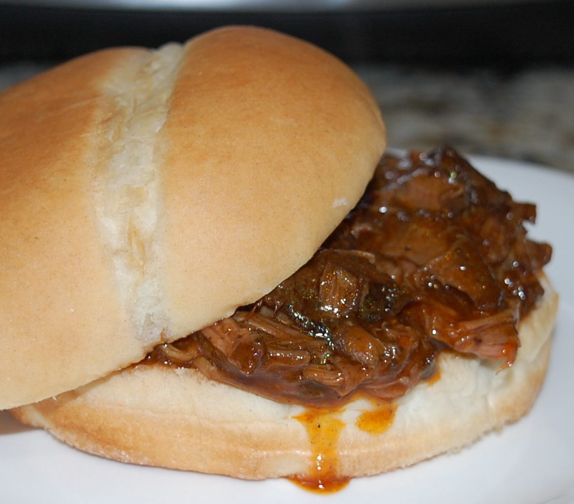 Slow Cooker Pulled BBQ Beef Sandwiches - StolenRecipes.net